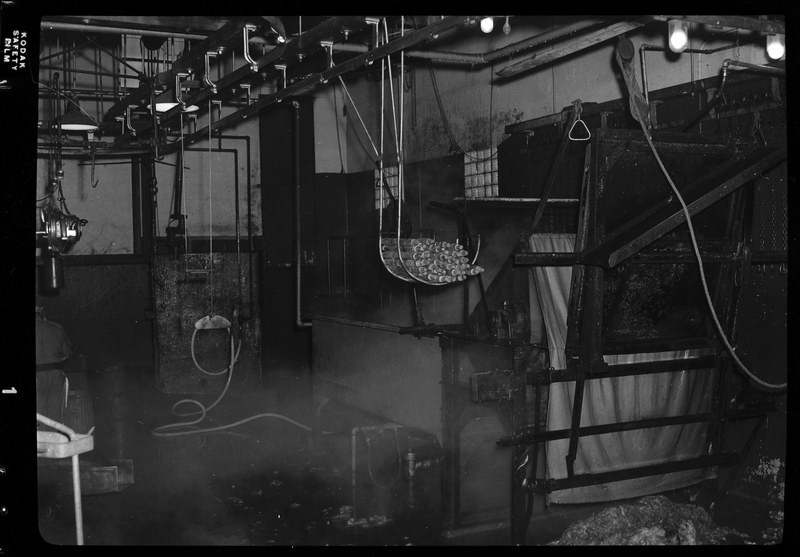 Photo of a large piece of machinery inside the Wallace Meat Company building.
