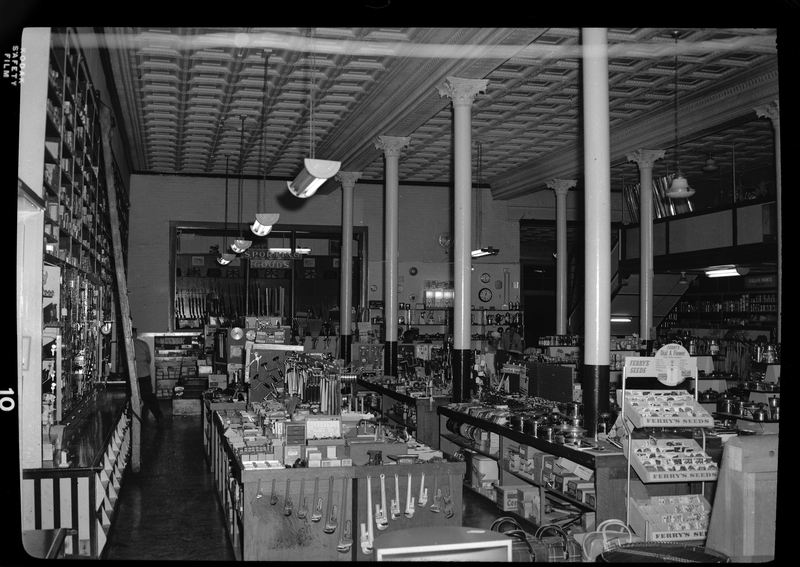 Photo of the interior of the Coeur d'Alene Hardware Store. There are shelves with various hardware equipment throughout the store for sale.