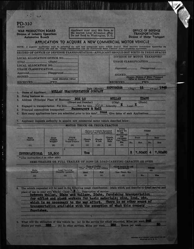 Photo of the front of a filled out application to acquire a new commercial motor vehicle from the Mullan Transportation company.
