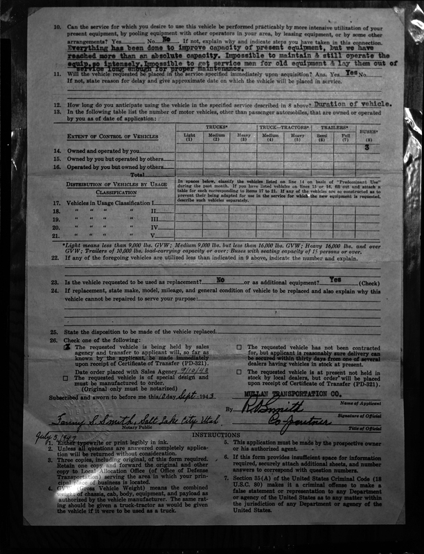 Photo of the back of a filled out application to acquire a new commercial motor vehicle from the Mullan Transportation company.