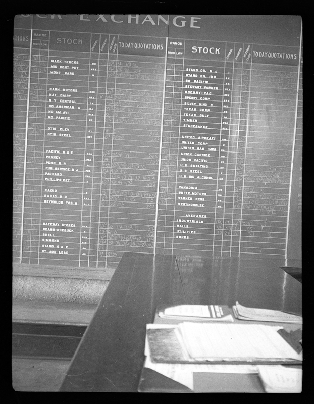 Photo of the stock exchange board, liking inside of Howarth Co. It's written on a chalkboard on one of the interior walls.