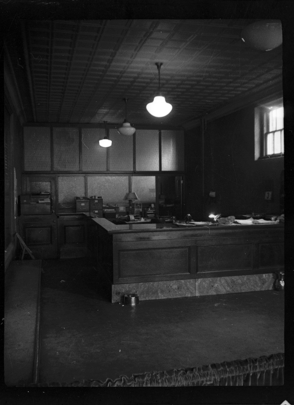 Photo of the interior of an unidentified office. The room is empty of people.