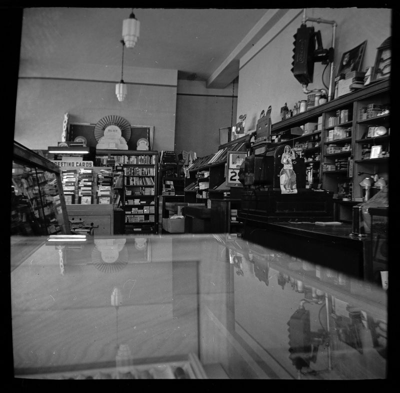 Photo of the interior of an unidentified store that sells books and greeting cards.