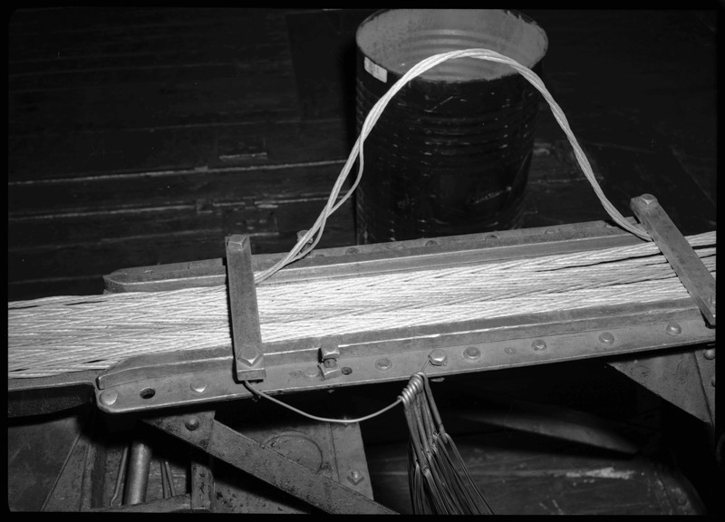 Ropes and equipment in a Morning Mine Facility. Previously described as: "Morning Mine rope house."