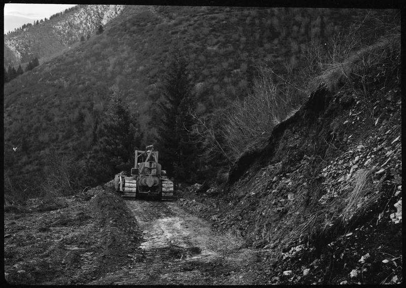 A piece of machinery moving through the dirt of the Greenough Operation at Lucky Friday Mine.