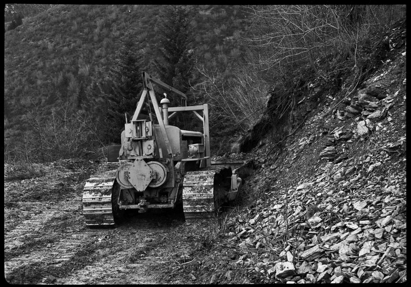 A piece of machinery moving through the dirt of the Greenough Operation at Lucky Friday Mine.