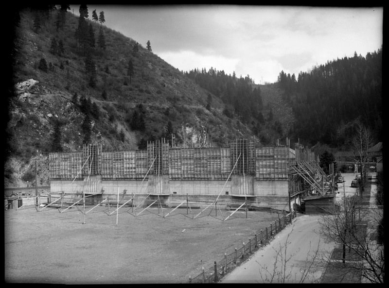A building under construction at Rock Creek Mine. Notes say that Rock Creek Mine is located 4 miles east of Wallace, Idaho.