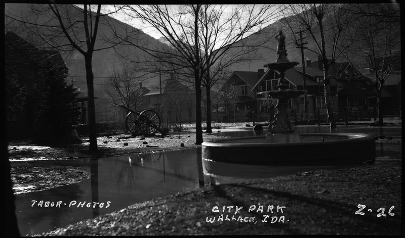 The City Park in Wallace, Idaho during a flood. There is water throughout the park.