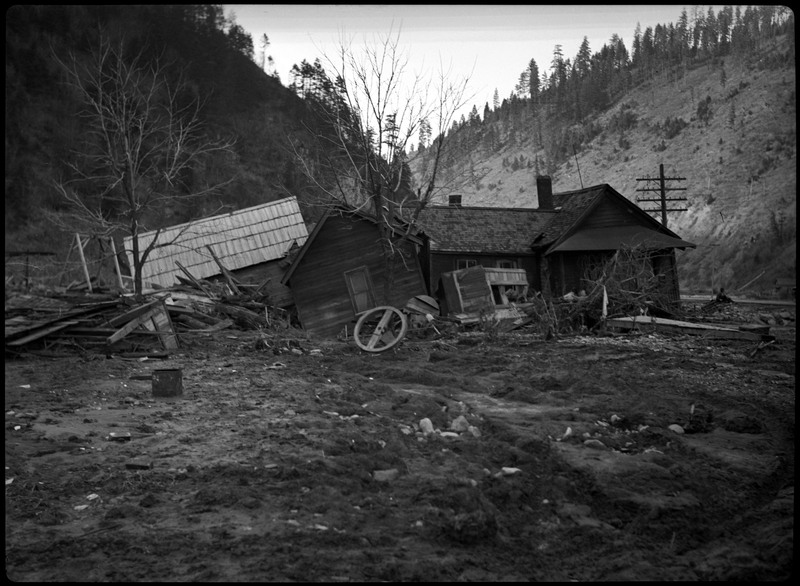 Damaged house and debris after a flood in Wallace, Idaho. 