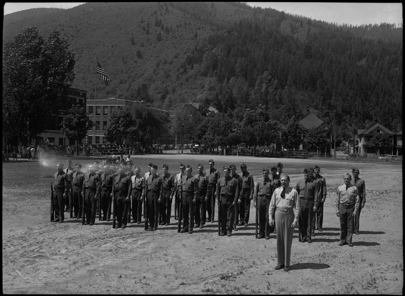 Co. K. Kellogg home guards stand in a field during a July 4th parade.