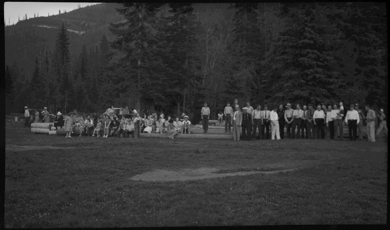 People gathered on a field for a police officers' picnic.