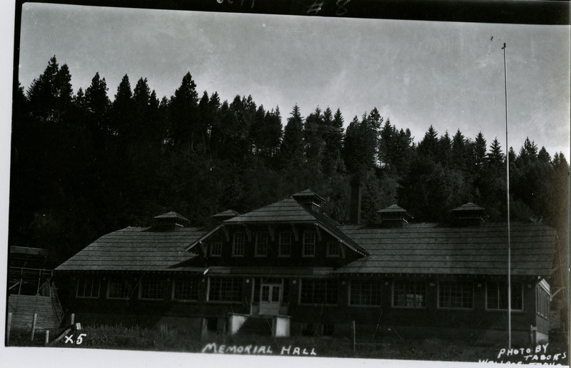 Postcard depicting Memorial Hall in Silverton, Idaho. Trees can be seen in the background.