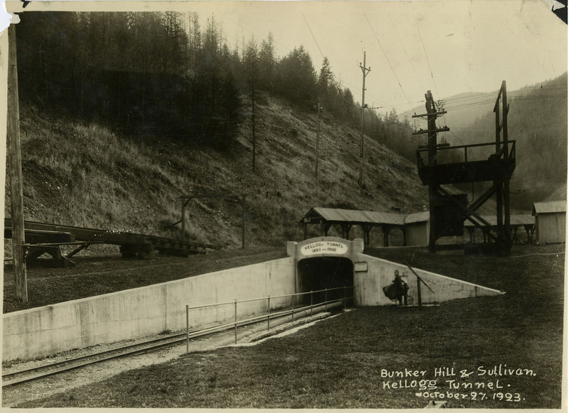 The entrance to Kellogg Tunnel. A person can be seen standing near the entry.
