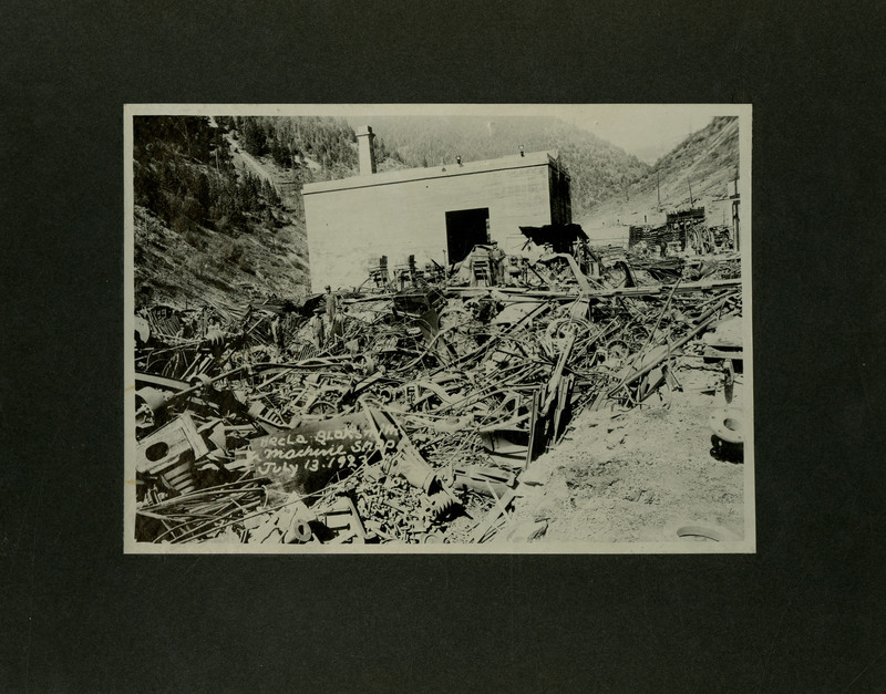 The ruins and remnants of the Hecla Mining Company blacksmith shop after a fire.