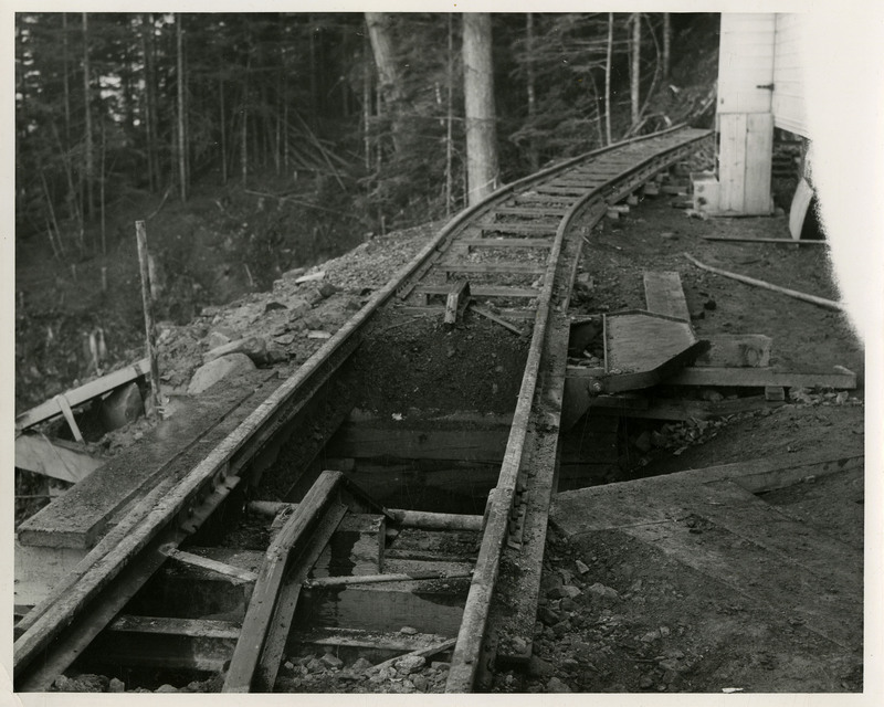 View of the mining railway track. There is a hole in the middle of the track.