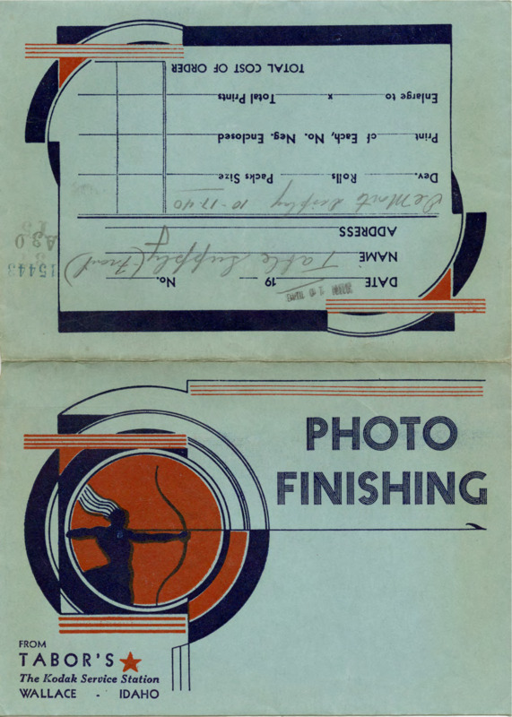 Blue photograph envelope with red and blue illustrations. Handwritten text on the outside flap reads "Table Supply (Front)" and "DeMonte Display 10-17-40." 