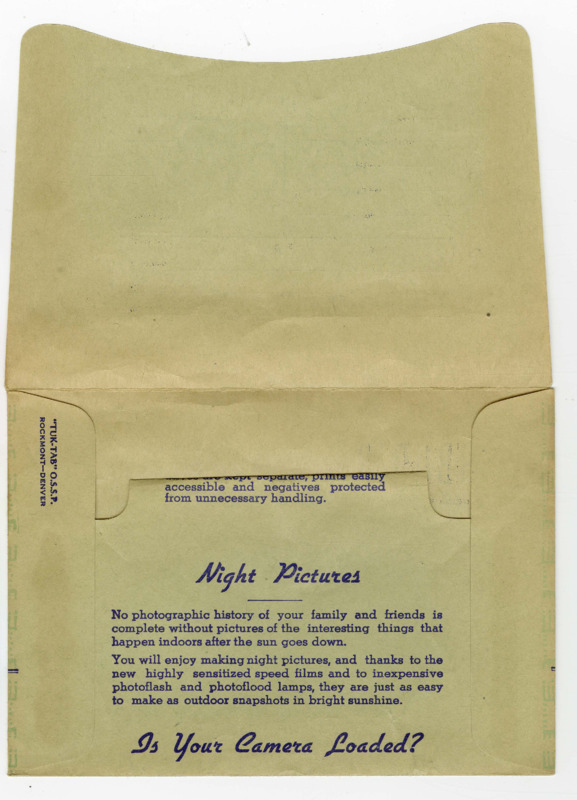 Green photograph envelope with handwritten text that reads, "Hill Climb  May-15-1938 Osburn Ida," "Osburn Hill Climb 1938," and "Hill Climb Osburn, Ida. 5-15-38" on the outside flap.