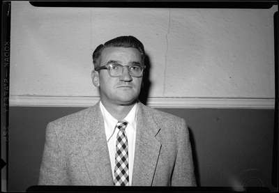 Photo of Mayor Clyde Murray. He's wearing a suit and looking at the camera.