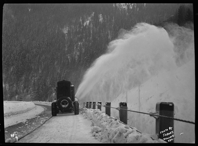 Photo of a snow blower removing snow from the road at Lookout Pass. The snow plower is referred to as Snow-Go Plow.