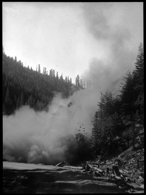 Smoke and dust from the blast which blocks the view of the blast site.