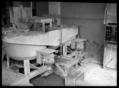 Side-view image of milling equipment owned by Hecla Mining Company and Star Mining Company. Based on the control panel on the wall, it could be an ore cleaner.