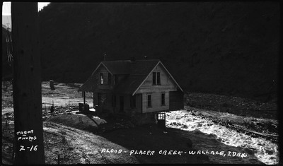 The ongoing flood in Wallace, Idaho that is rushing up to an already damaged house.