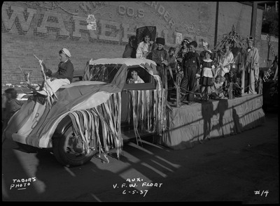 The Aux. V.F.W. float with children dressed up in costumes during the Benevolent and Protective Order of Elks parade.