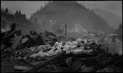 Closeup of ruins consisting of different materials from a fire in Wallace.