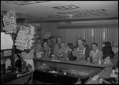 Image of the bar area and people standing behind the bar area during the Albie's March of Dimes event.
