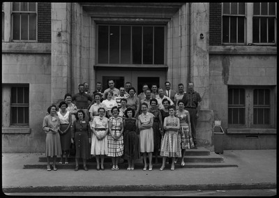 A group portrait of the Wallace High School class of 1940 20th reunion.