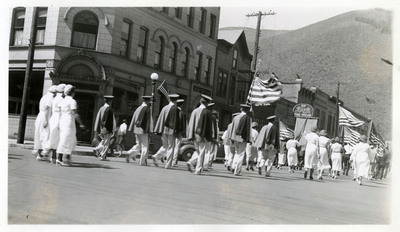 A marching band passes as part of the Memorial Day parade.