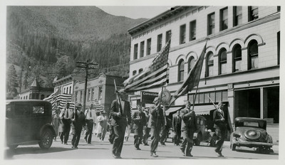 A marching band passes as part of the Memorial Day parade.