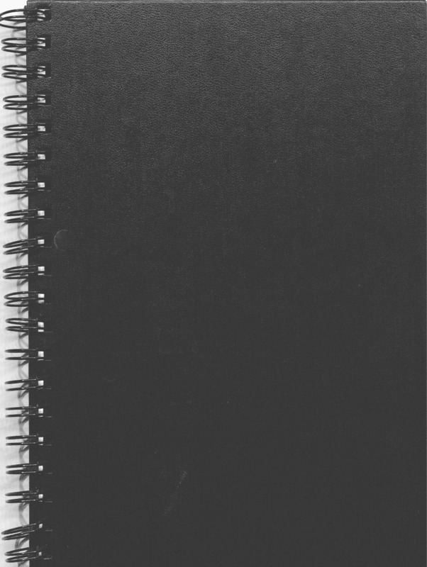A notebook with a spiral binding.