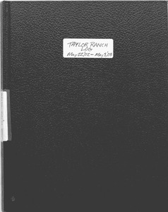 A notebook with a label on the front reading "Taylor Ranch Log May 22, '02 - May 3, '03."
