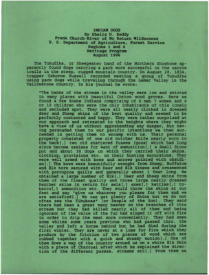 A copy of "Indian Dogs" by Sheila D. Reddy with a line drawing of wolves.