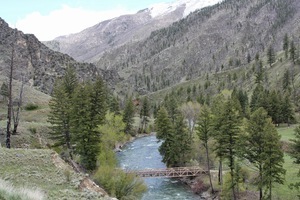 Bridges across Big Creek used to be old swinging bridges. In the 50s and 60s, the USFS began replacing the old bridges with steel span bridges. The bridge segments were flown to Taylor Ranch.