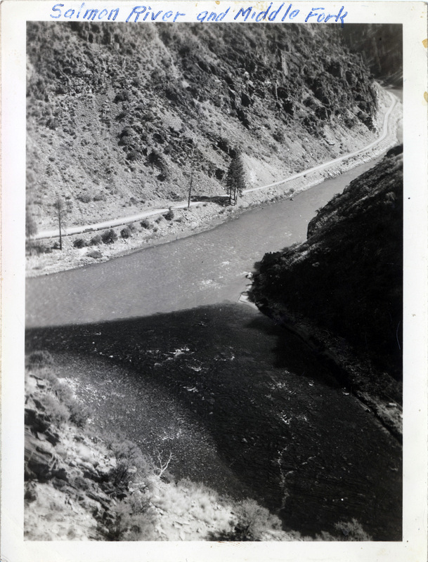 A view from above of a road next to a river. "Salmon River and Middle Fork" is written on the front of the photograph.