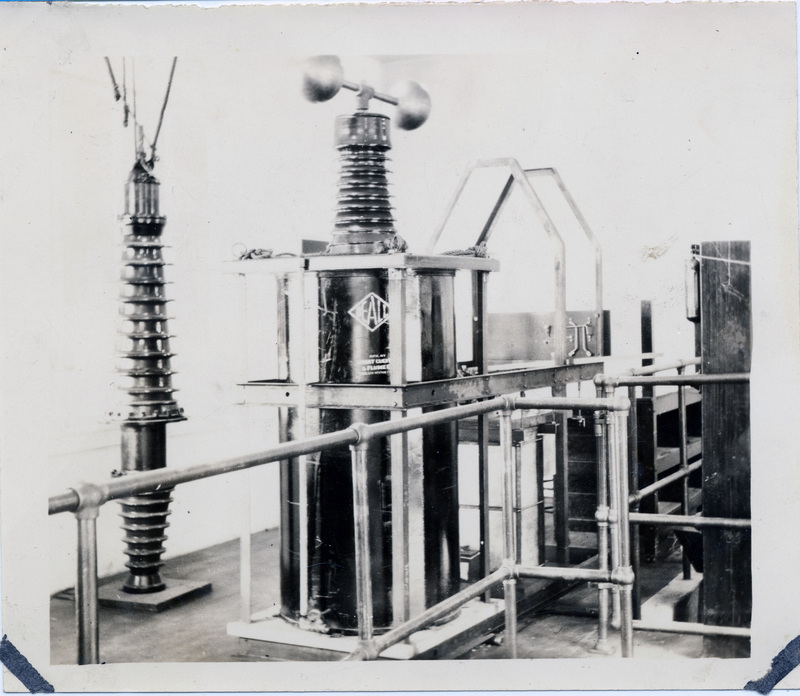 Scientific equipment behind a barrier.