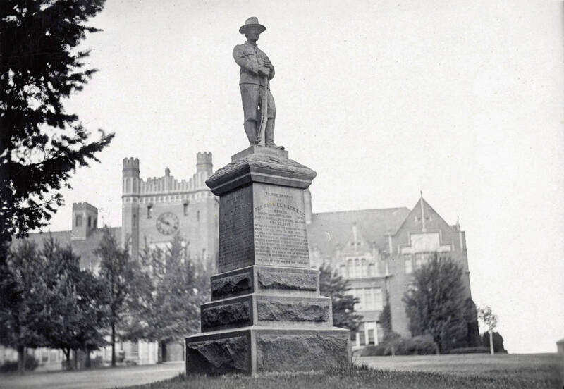 1924 photograph of Spanish American War Memorial. Administration building in the background.