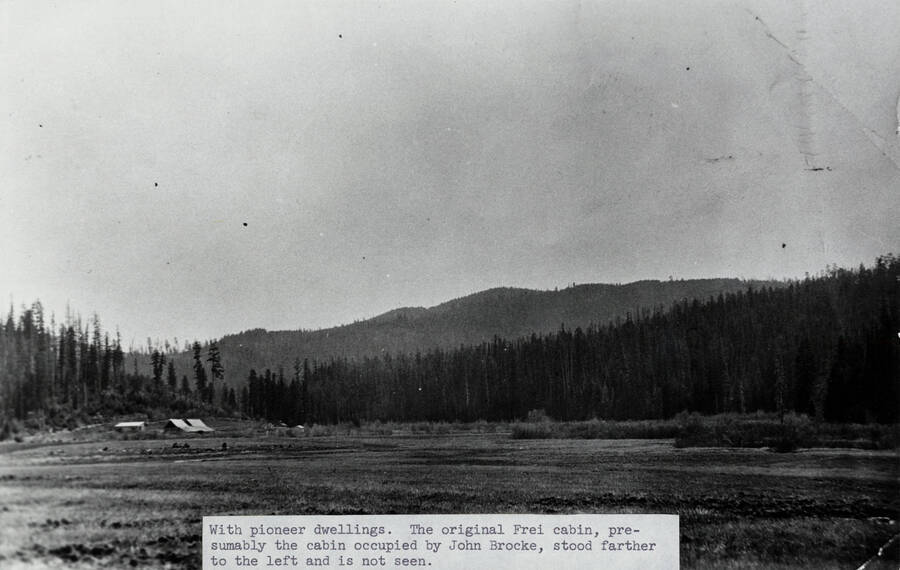 Pioneer dwellings in the Frei Meadow near Bovill. The original Frei cabin, presumably the cabin occupied by John Brocke, stood further to the left and is not seen.