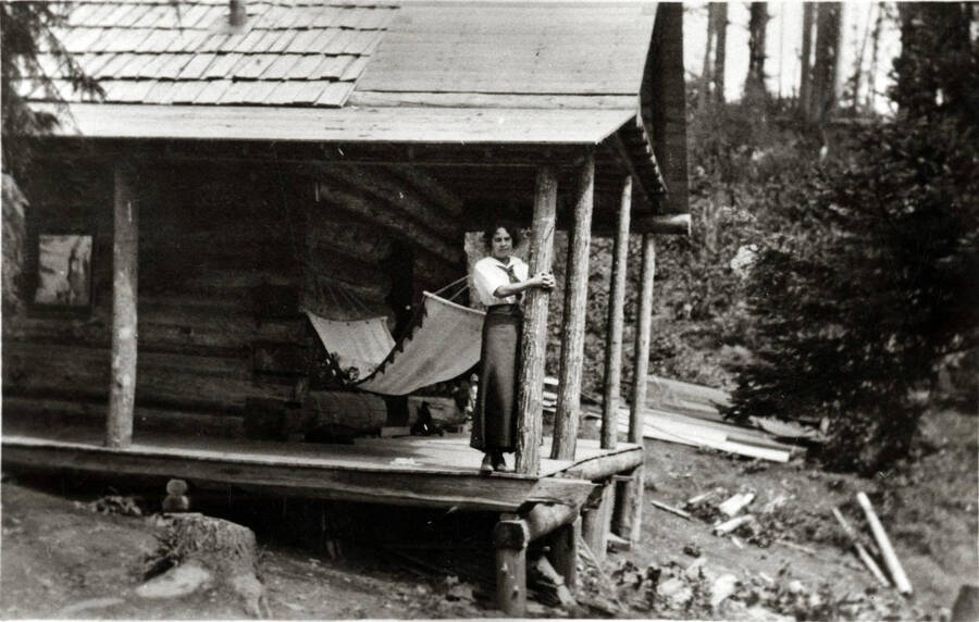 Ethel Bean on the porch of her cabin in Elk River, Idaho.