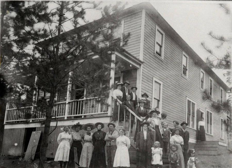 On Park Avenue near the north edge of town. This building burned down in late 1912 or early 1913, not long after fire destroyed the Groh store. A group of unidentified people stand in front of the house.