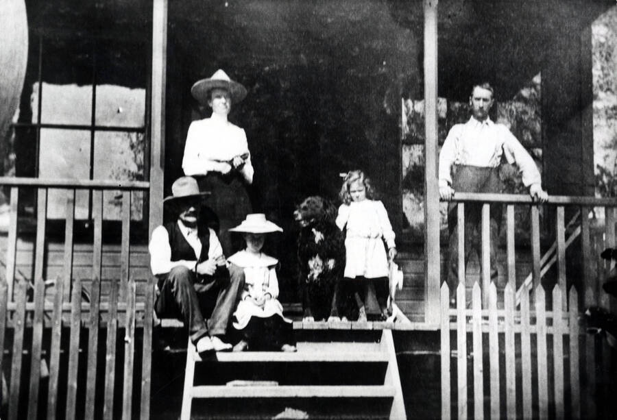 Seated, left to right: Hugh Bovill and his daughter Dorothy. Standing, left to right: Charlotte Bovill, Gwendolyn Bovill, Forbes Fosberry and dog 'Di.'
