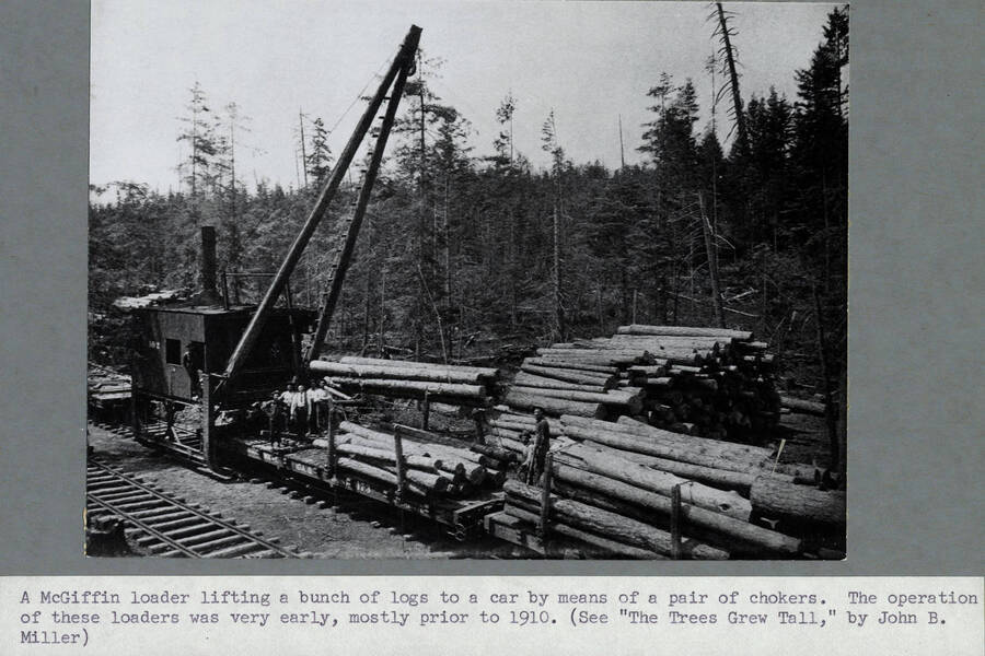 A McGiffin loader lifting a bunch of logs to a car by means of a pair of chokers. The operation of these loaders was very early, mostly prior to 1910. Copy of a photo in 'Potlatch Lumber Company' booklet.