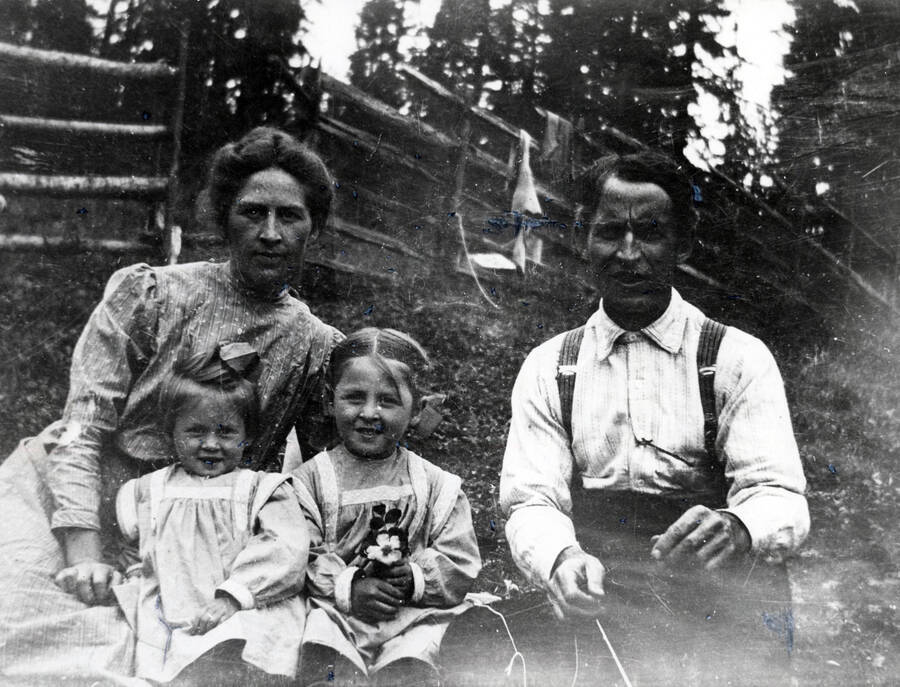 Left to right: Kate Olson, Ruth Olson, Winnifred Olson, and Emory Olson on their homestead southeast of Helmer, Idaho
