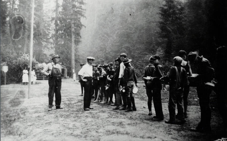 A group of Boy Scouts at Camp Grizzly. Jimmy Costello, left, and Leo Guilfoy are standing in front of the line.