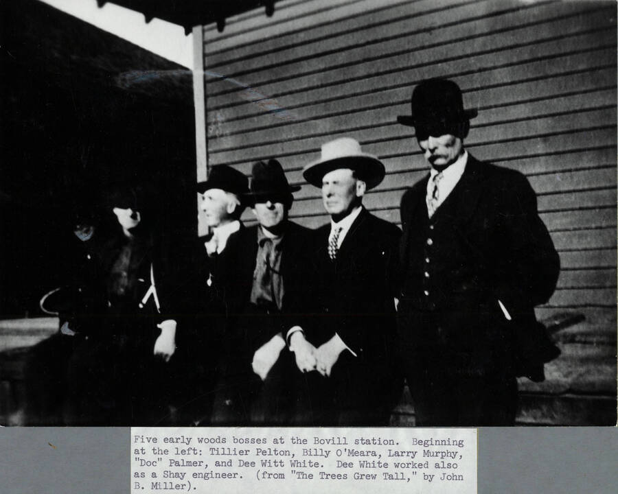 Woods bosses at the Bovill train station. Left to right: Tillier Pelton, Billy O'Meara, Larry Murphy, 'Doc' Palmer, Dee Witt White.