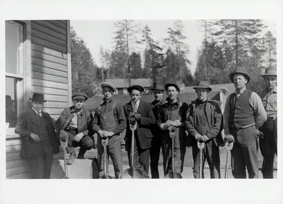 A crew of volunteer laborers. Left to right: Dudley Hobbs, Harry Long, unidentified, unidentified, Jimmy Gilroy, Minnis Anderson, Buck Chambers, Henry Mallory, Pete David.