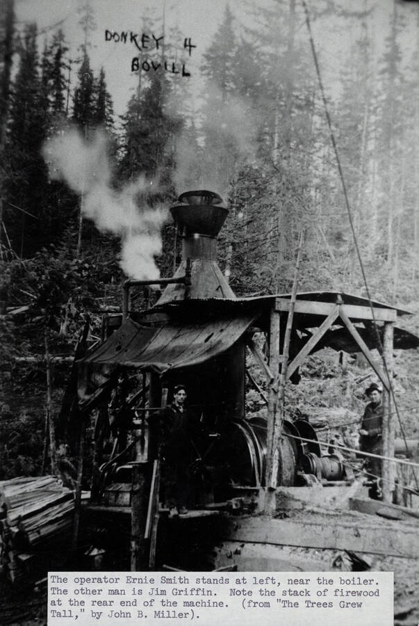 Donkey 4 Bovill.' A donkey engine operating at Potlatch Lumber Company's Camp 8. Ernie Smith, left, and Jim Griffin.