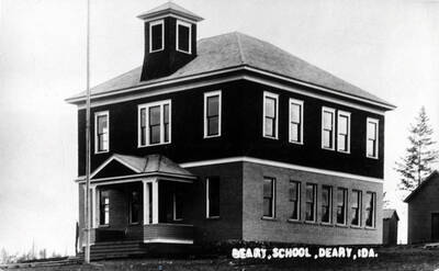 The old Deary schoolhouse, built about 1912. Charlie Miller and John G. Miller helped build it. Charlie Miller fell from the building, was injured, and died in 1915 as an indirect result.